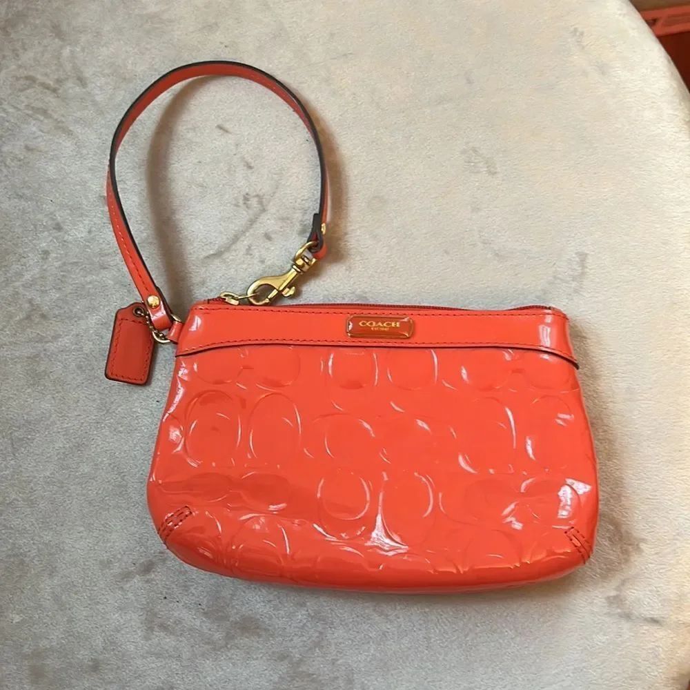 Coach Coral Orange Patent Embossed Logo Wristlet